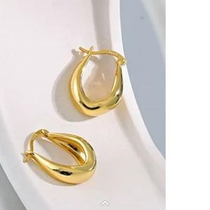 18 k gold plated huggie earrings.